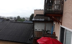 Deštivý Golling z okna hotelu