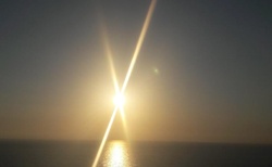Západ slunce nad pláží Milos